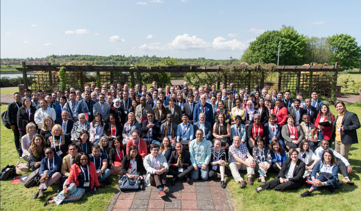 A large group of representitives from national hemophilia organizations gather