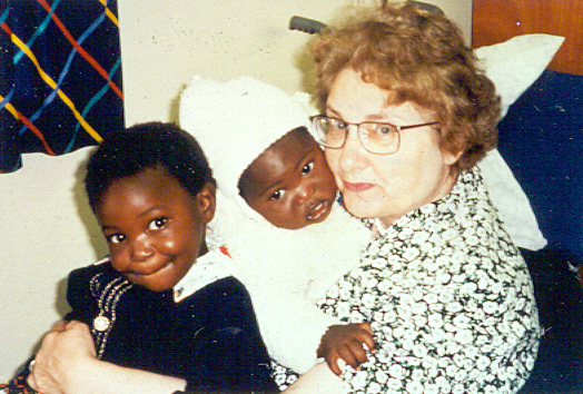 Carol Kasper with two South African patients
